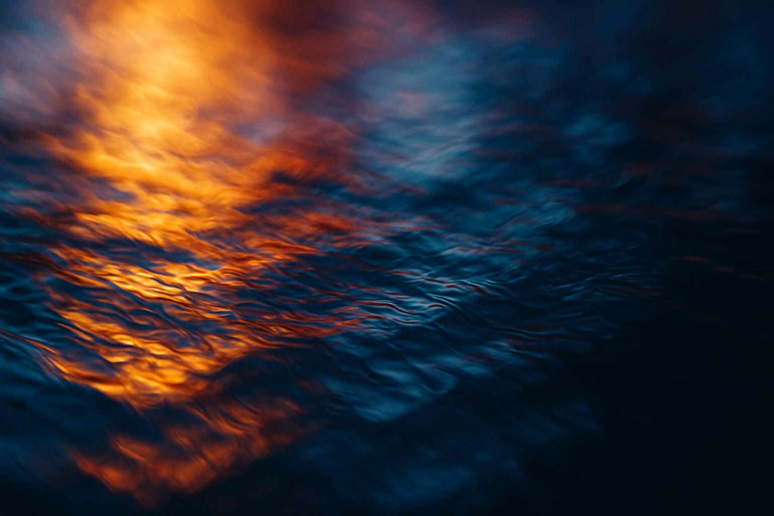 Abstract photograph capturing vibrant colors, textures, and motion blur to create an impressionistic and surreal visual experience.